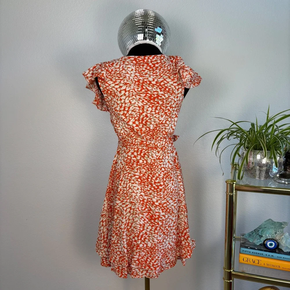Free People French Quarter mini wrap dress, Small Orange White Animal Print boho